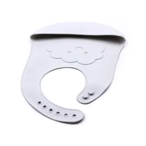 Silicone baby bib detail showing soft waterproof material, cloud embossed pattern, and adjustable clasp.