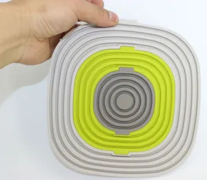 Multifunctional foldable silicone heat resistant kitchen pot holder trivet pad gray and green