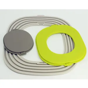 Silicone heat insulation mat set, three-piece foldable pot holder and kitchen placemat.