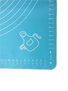 Silicone kneading mat detail, blue baking mat with clear cm scale markings for pastry baking.