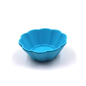 Blue silicone muffin cup flower cake mold, detailed view for baking and kitchen use.