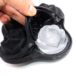 Close up view of black silicone rose ice cube mold detail, flexible material showing ice flower shape.