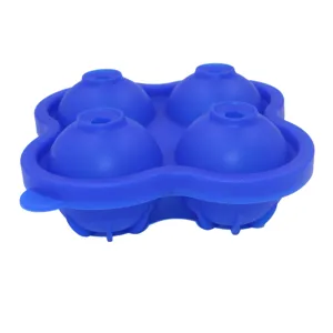 Blue silicone 4-cavity sphere ice mold for making round ice balls, whiskey, and cocktails easily.