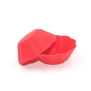 Red silicone muffin cups baking molds, flexible non-stick cupcake liners for kitchen use.