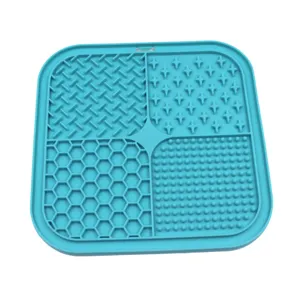 Detail showing four different texture patterns on a blue silicone pet lick mat