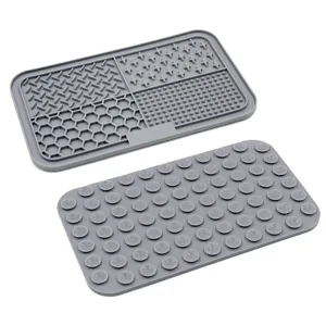 Alfombrilla de alimentación lenta para mascotas de silicona con ventosas, color gris.