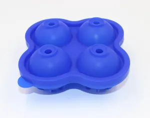 Blue 4-cavity silicone ice ball mold, flexible sphere ice tray for drinks and cocktails.