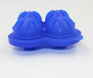 Blue silicone 4 cavity ice ball mold detail view, flexible sphere ice cube tray maker tool.