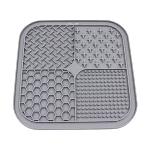 Detailed top view of grey silicone pet lick mat with four different textured quadrants