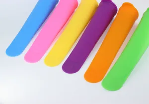 Multicolor silicone ice pop molds set, flexible popsicle maker for home kitchen use.