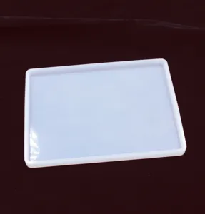 White translucent rectangular silicone mold for DIY resin casting, handmade craft tray making.