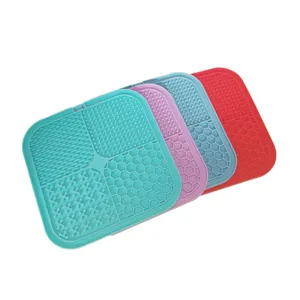 Silicone pet slow feeder mat for dogs and cats, multi-texture interactive lick pad.