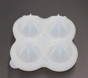 Detailed view of the 4-cavity silicone diamond ice cube tray mold, flexible and transparent.