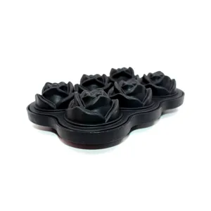Detailed view of the 6 cavity black silicone rose ice mold, flexible and easy to release.