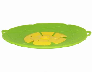 26cm grüne Silikon Ueberlaufschutz Topfdeckel mit gelbem Blumen Griff fuer Kueche.