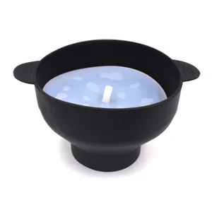 Silicone popcorn maker detail view showing the collapsible black bowl and translucent lid.