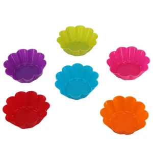 Colorful silicone muffin cups set, flower shaped baking molds for cupcakes and pastry.