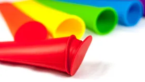 Silicone ice pop mold detail close up, colorful tube design for homemade frozen treats.