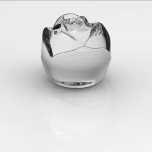 Close-up detail of the clear crystal rose sculpture showing exquisite transparent petals and reflection.