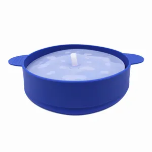 Foldable silicone popcorn maker bowl with handles for microwave use, blue kitchen tool.