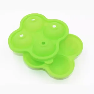 Green silicone 4-cavity ice ball mold tray for whiskey cocktails and kitchen bar tools