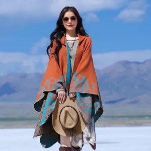 Close-up of bohemian hooded poncho with paisley pattern against salt flat backdrop