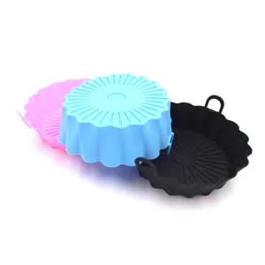 Silicone air fryer pot detail view, showing multi-color non-stick baking liner with handles.