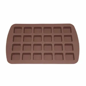 Macro detail of a brown 24-cavity square silicone mold for chocolate, cake and ice cubes