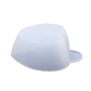 Translucent blue silicone mixing cup with spout for DIY epoxy resin crafting, main view.