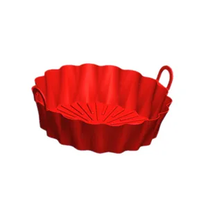 Silicone air fryer pot detail view, red heat-resistant liner with handles for baking.