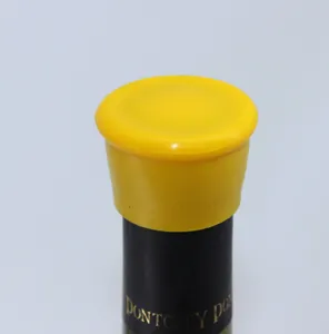 Silicone wine bottle stopper detail showing bright yellow cap for fresh wine sealing.