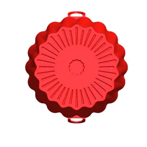 Red silicone air fryer pot bottom detail, non-stick baking liner with handles for easy use.
