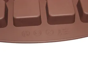 Close-up detail of temperature resistant markings on a brown silicone cake mold