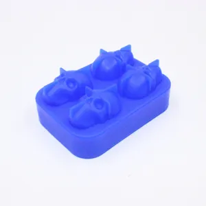Blue silicone ice tray with 4 detailed skull-shaped cavities for themed parties