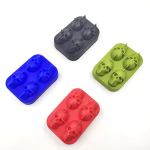 Set of colorful 4-cavity skull-shaped silicone ice cube trays for Halloween parties