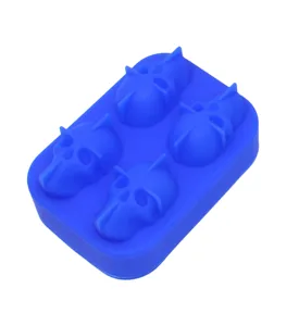 A close-up view of a blue 4-cavity skull silicone mold for creative ice or chocolate cubes