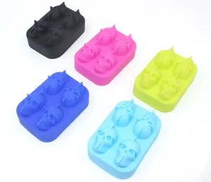 Set of 4-cavity silicone skull ice cube trays in multiple vibrant colors for parties