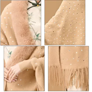 Close-up detail view of a warm knitted shawl with sequins, faux fur collar and tassels.