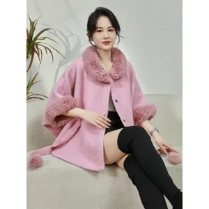 Elegant pink faux mink fur shawl cape with large fur collar and waist belt detail.