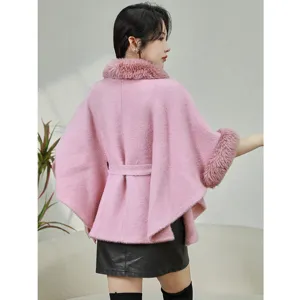 Back view of elegant pink faux mink fur cape coat with large fur collar and belt