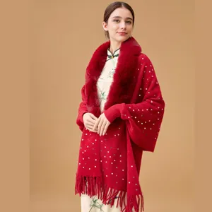 Elegant red knitted shawl with sequins and a luxurious faux fur collar for winter.