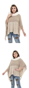 Stylish women's chenille knit poncho with white faux fur collar and fringe tassels