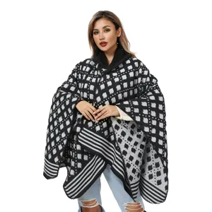 Womens knitted hooded poncho shawl with black and grey geometric pattern for winter