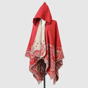 Warm red knitted hooded poncho shawl featuring elegant beige paisley patterns for winter.