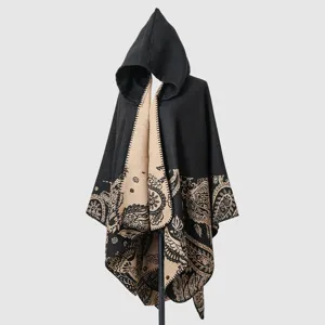 Elegant black and camel hooded knit poncho featuring detailed ethnic paisley patterns