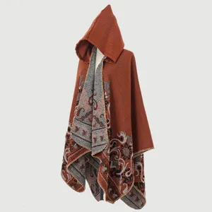 Detailed view of women's knitted hooded poncho shawl with grey vintage jacquard pattern