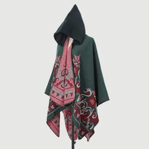 Elegant hooded knit shawl with intricate red floral jacquard pattern on dark green