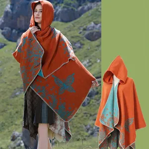 Detail of hooded knitted shawl with butterfly pattern on model and mannequin.