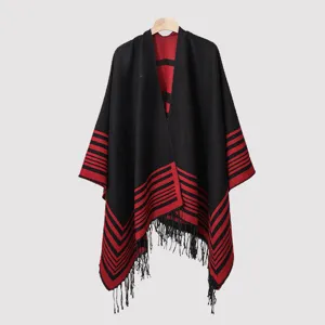 Detailed view of a men's knitted shawl with red stripes and long fringe tassels