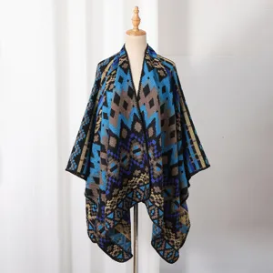 Close-up of a men's knitted shawl featuring a striking blue and brown geometric pattern